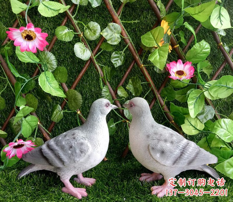 潍坊雕塑小女孩一只手拿书一手和平鸽