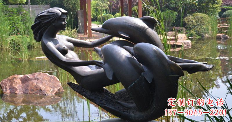 潍坊公园海豚和女孩景观铜雕