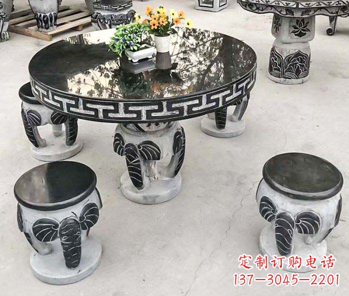 潍坊圆形桌凳石雕-为公园景观增添艺术气息