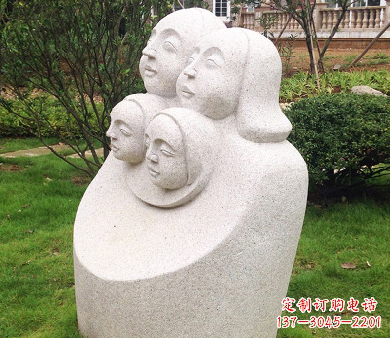潍坊公园母子人头像石雕
