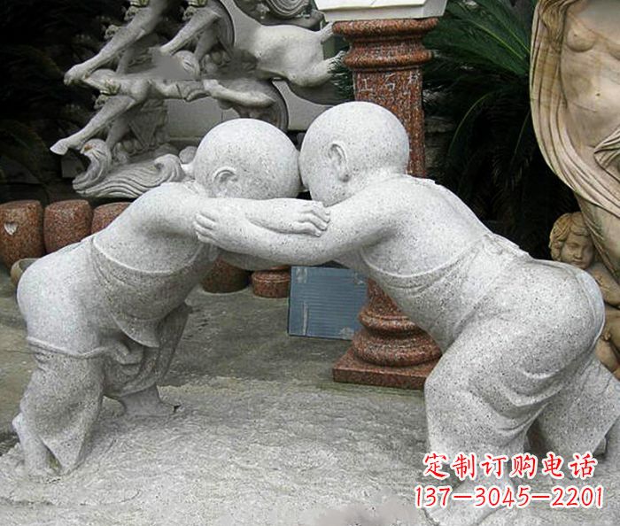 潍坊可爱小孩摔跤石雕