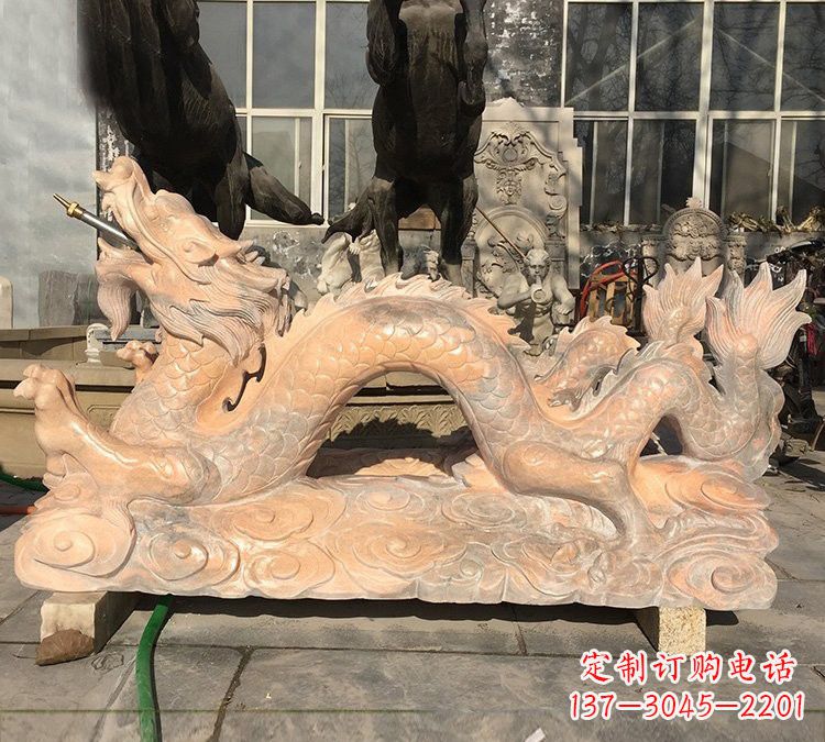 潍坊晚霞红石雕喷水龙
